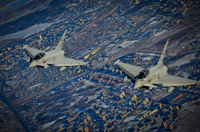Illustration for article titled These Shots Of Fulcrums and Eurofighters Over Lithuania Are Amazing